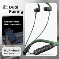 Green wireless earbuds with dual pairing feature on a gray background