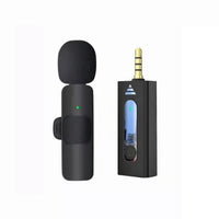 Black wireless microphone set with receiver on a white background
