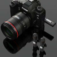 Canon EOS 5D camera with lens on a dark background