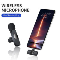 Wireless microphone with smartphone displaying a rocket launch on screen