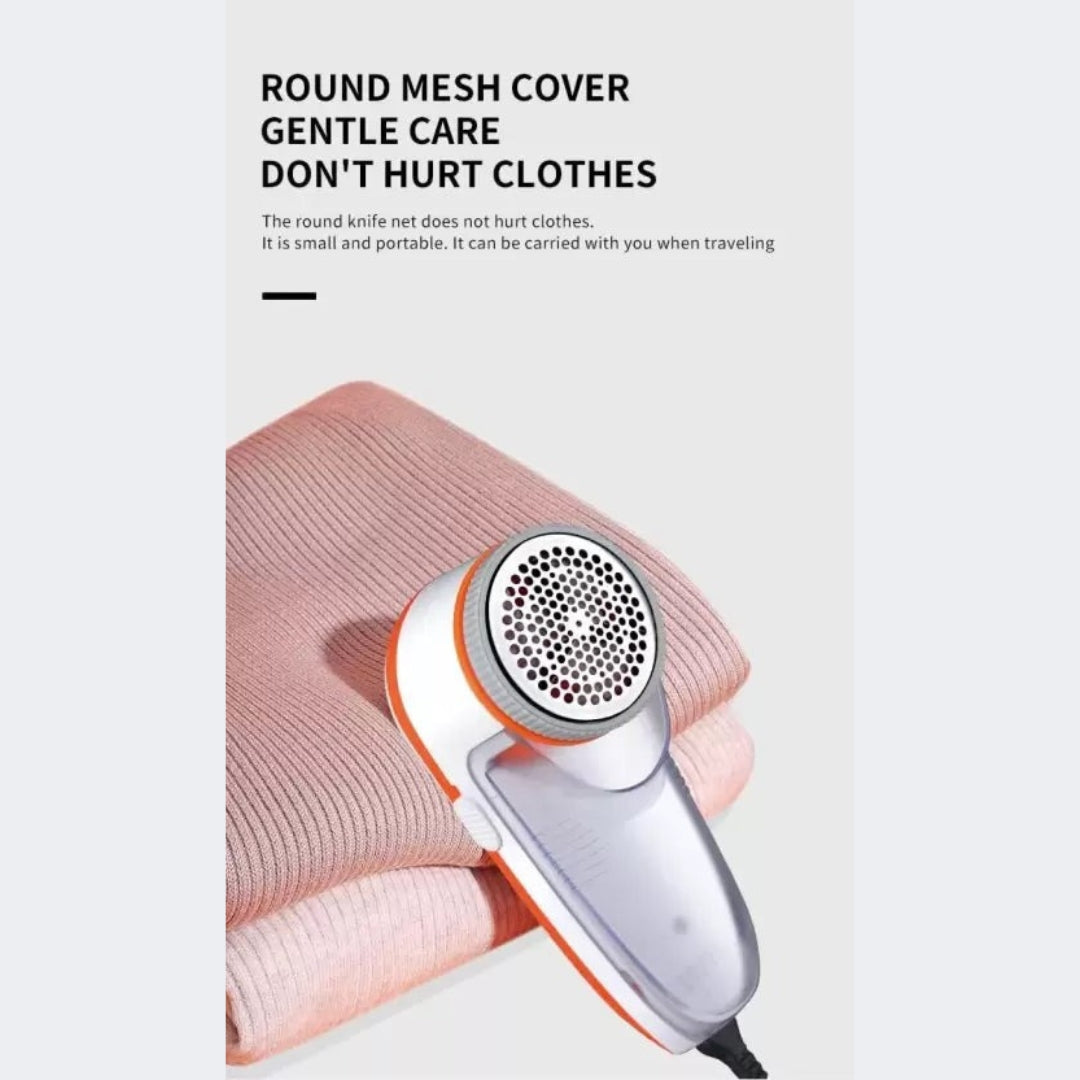 Fabric shaver with round mesh cover on a light pink fabric background