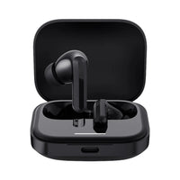 Black wireless earbuds in a charging case on a white background