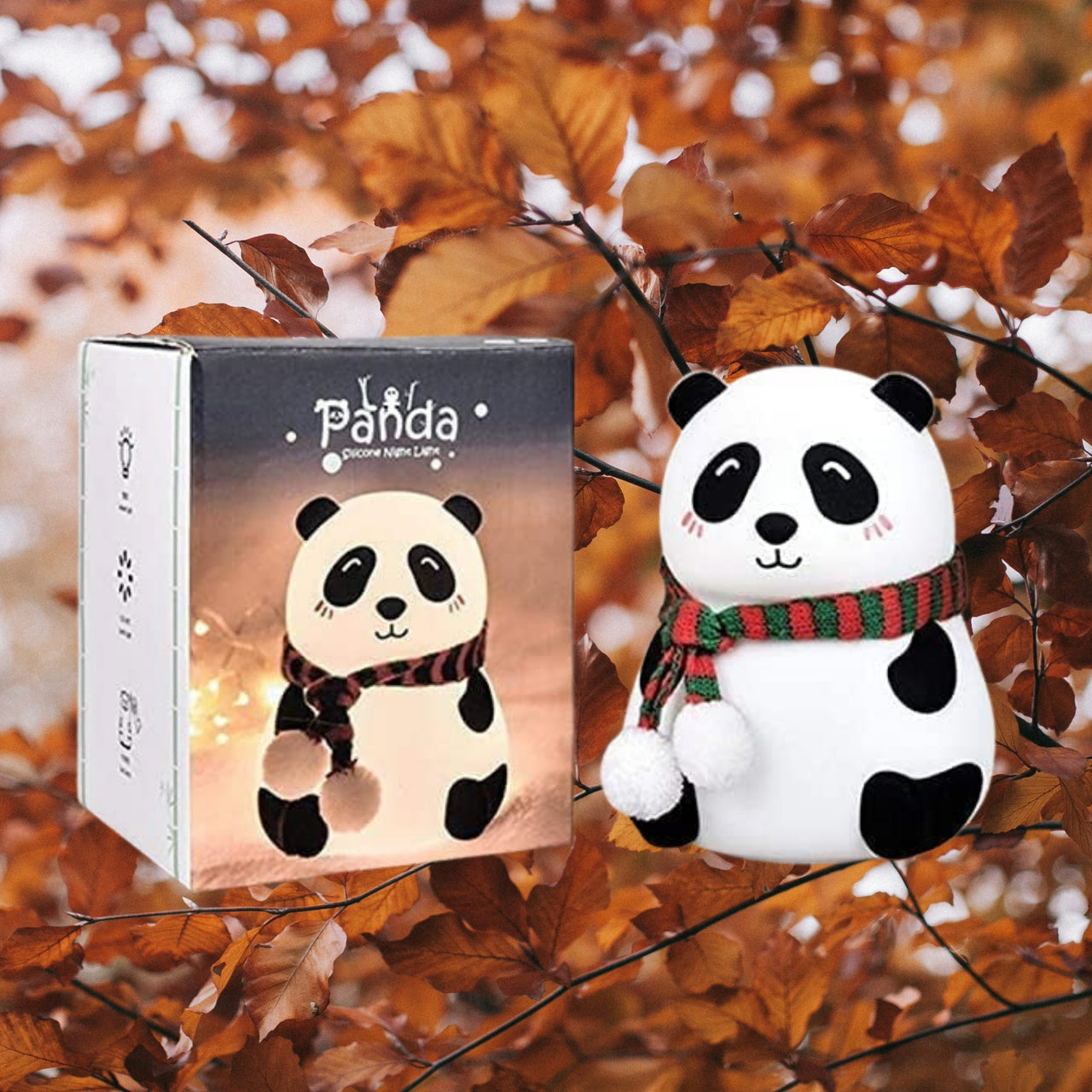 Panda-shaped night light with packaging on a leafy background