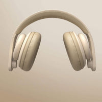 Beige headphones on a beige background
