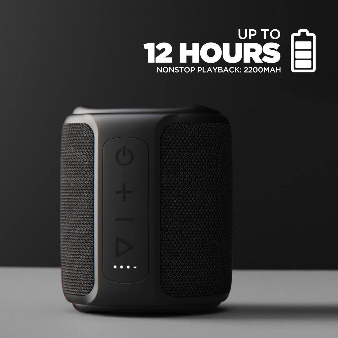 Black portable speaker with battery information on a dark background