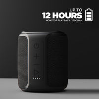 Black portable speaker with battery information on a dark background